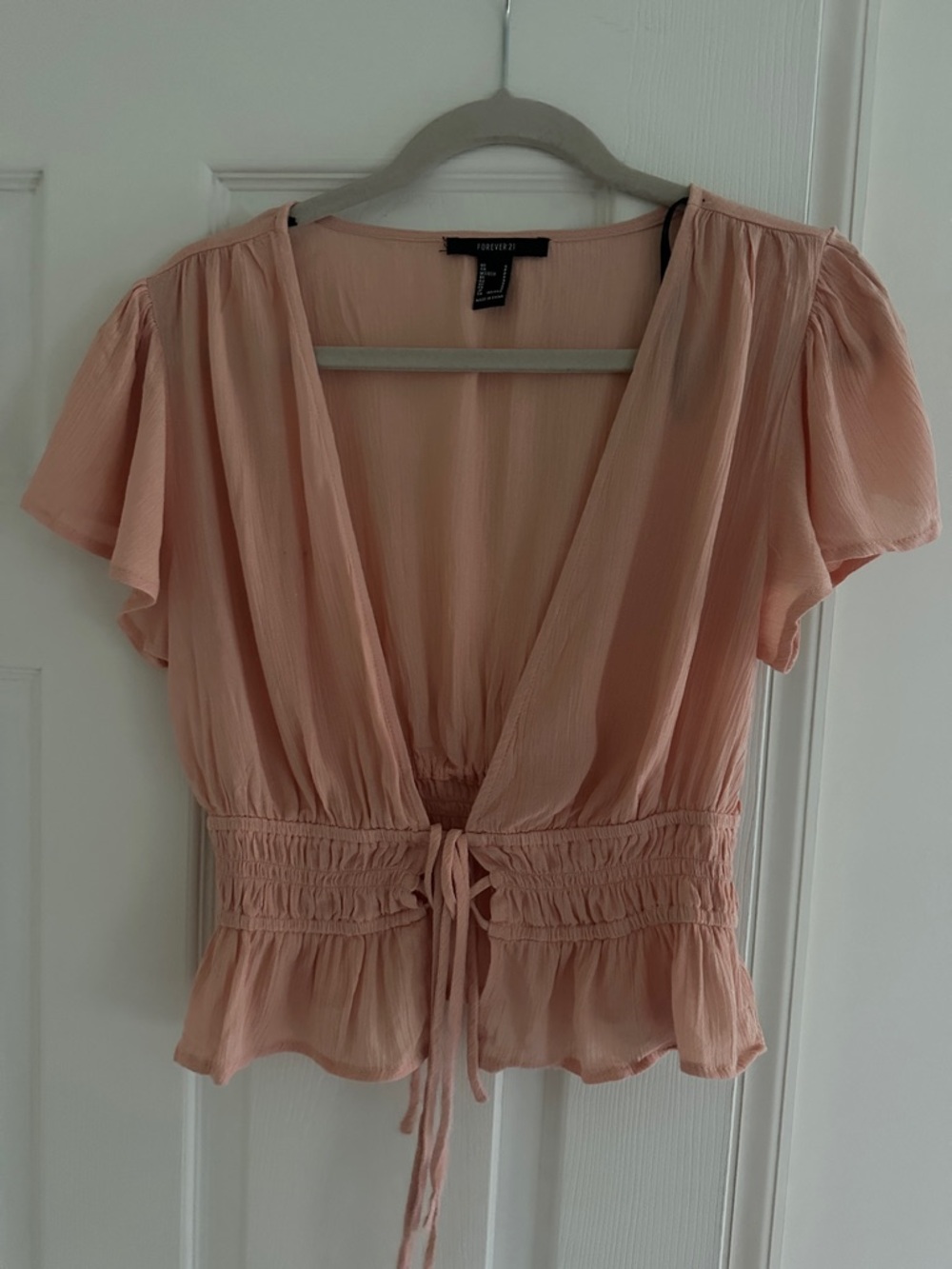 Forever 21 Peach Tie-Front Smocked Peplum Blouse